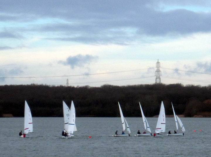 Photo of dinghies sailing for Cambridge sailing support funds